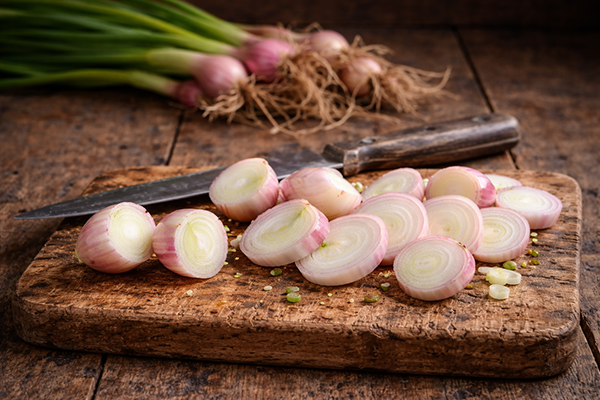 Sliced Egyptian Walking Onion ground bulbs.