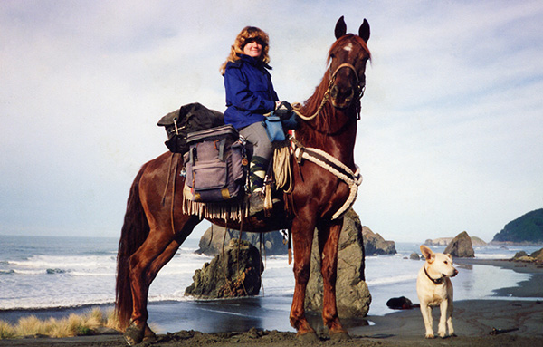 Tracy, Dawn, and Myles the dog on the Oregon coast.